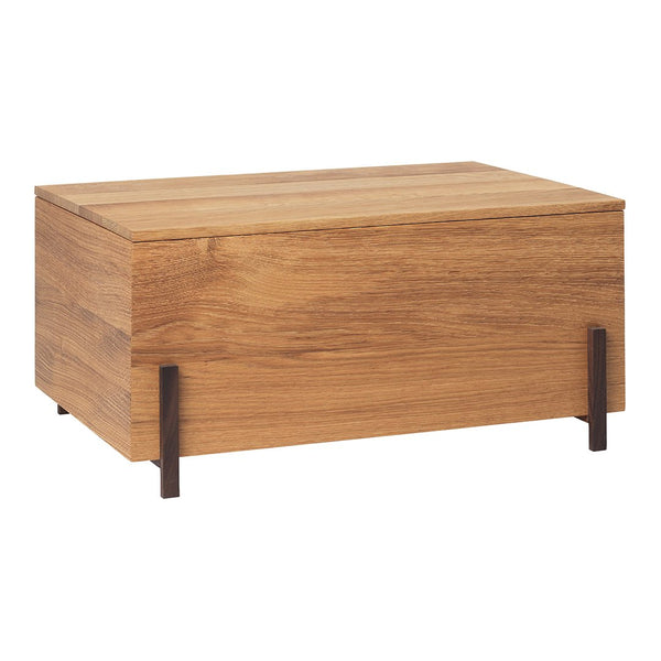 Wooden storage box with a natural oak finish and black metal legs. Simple, modern design with clean lines.