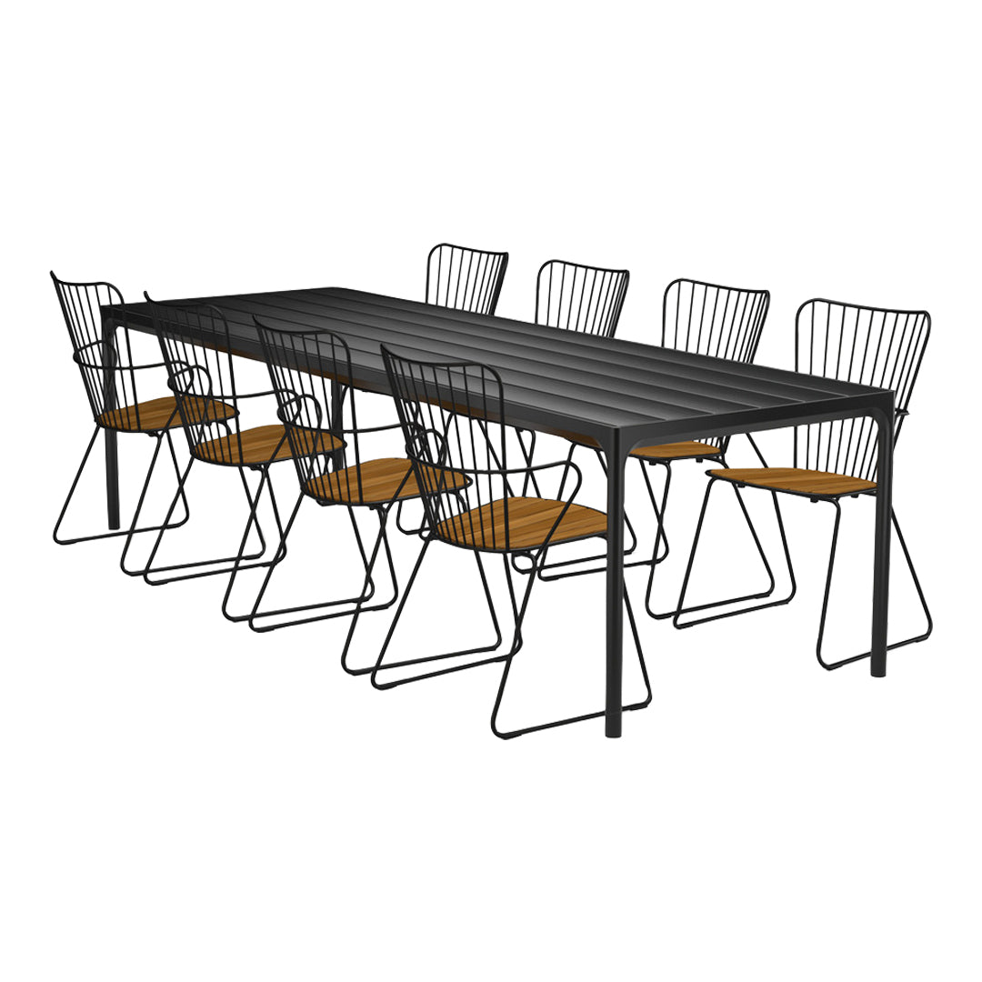 Black metal dining table with sleek lines, paired with wire chairs featuring warm wooden seats. Elegant modern design.