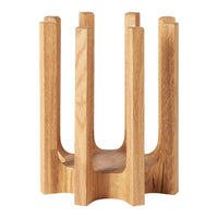 Natural wood plant holder with a minimalist design and smooth finish, featuring a light oak color and simple geometric pattern.