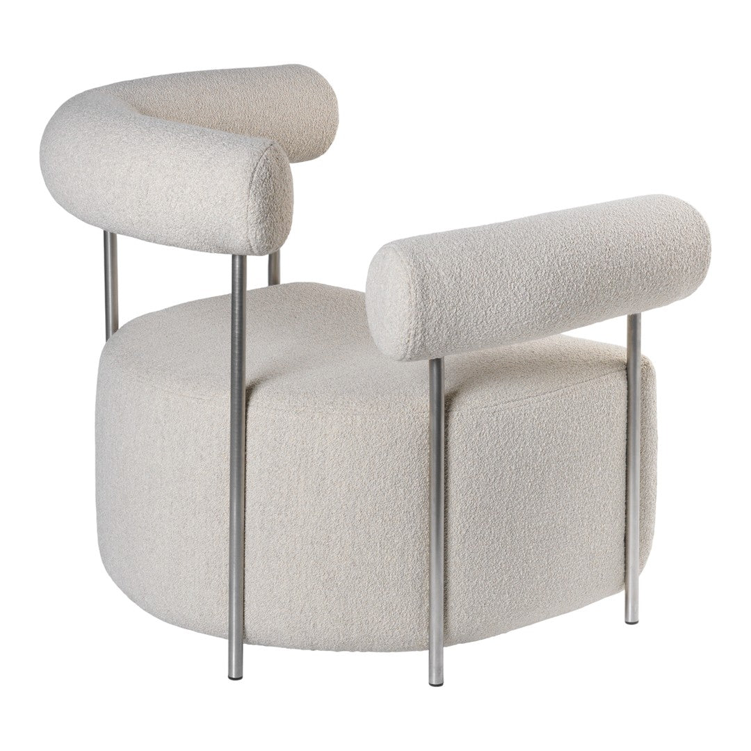 Modern curved chair in soft white upholstery with sleek metal legs, featuring a minimalist and contemporary design.