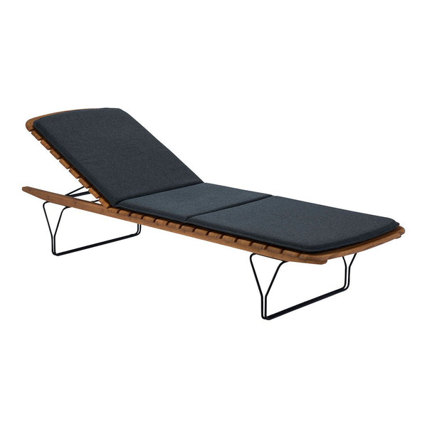 Black padded lounge chair with wood accents and sleek metal legs, perfect for outdoor relaxation.