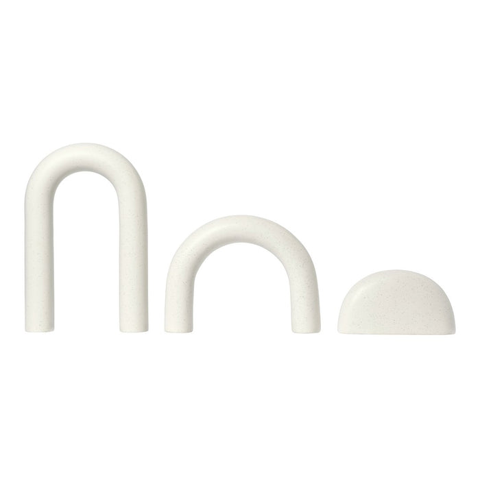 Set of three white silicone shapes including arches and a half-circle, featuring smooth, matte finishes.