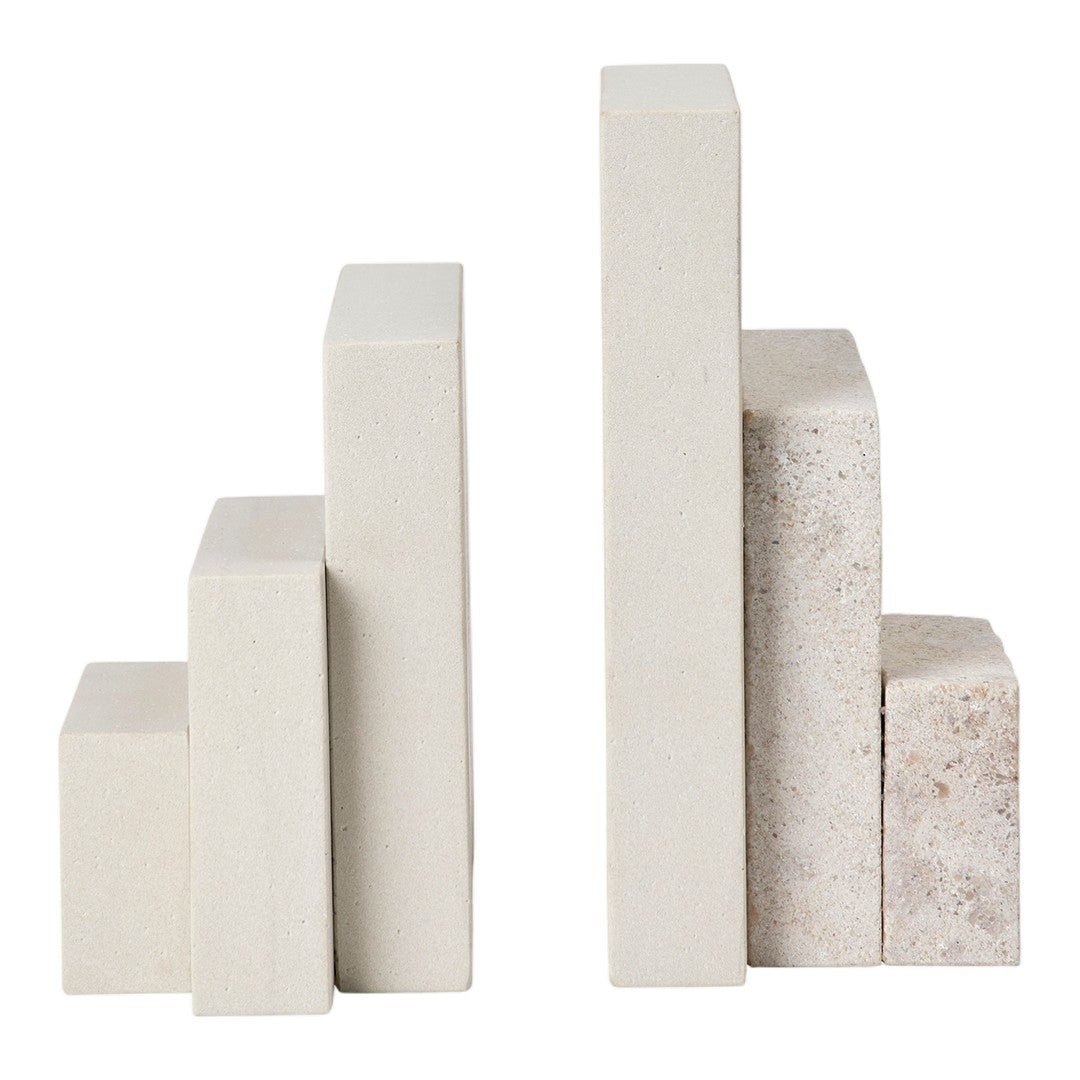 Natural stone bookends in light gray and beige, featuring smooth surfaces with subtle textures and clean lines.
