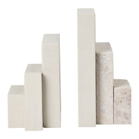 Natural stone bookends in light gray and beige, featuring smooth surfaces with subtle textures and clean lines.
