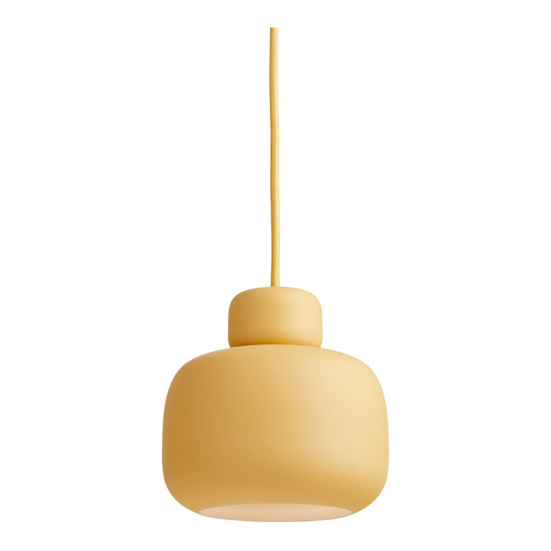 Yellow matte pendant lamp with a rounded design and matching cord, perfect for adding a pop of color to any space.