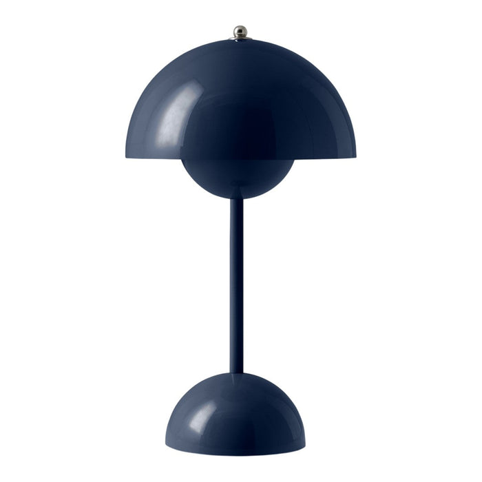 Dark blue modern table lamp with a sleek, minimalist design and smooth, rounded shapes.