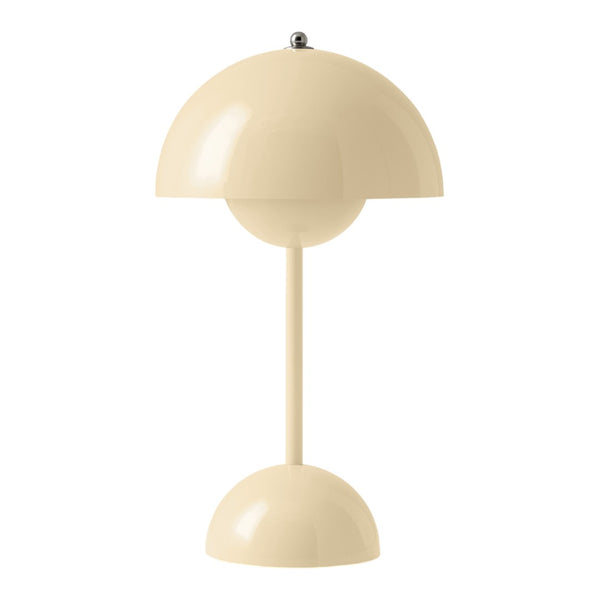 Beige modern table lamp with a sleek, rounded shape and smooth, glossy finish. Perfect for minimalist decor.