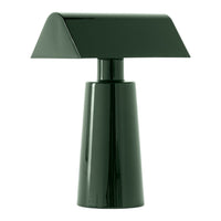 Green modern table lamp with a sleek, geometric design and glossy finish. Ideal for contemporary decor.