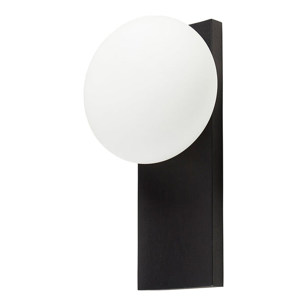 Black wall-mounted light fixture with a round white glass shade, creating a modern and stylish contrast.