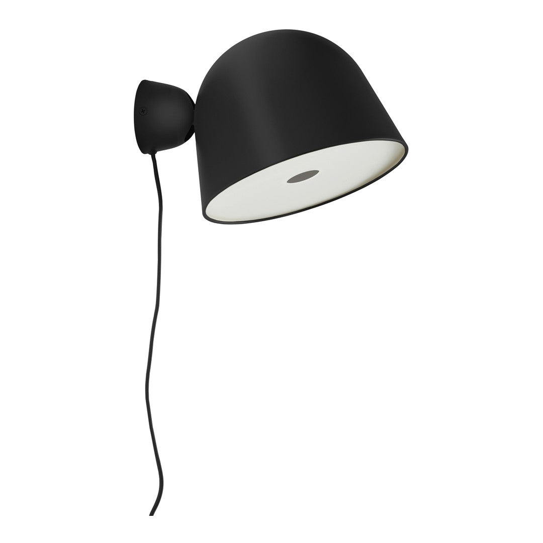 Black wall lamp with a sleek, matte finish and a contrasting white interior, perfect for modern decor.