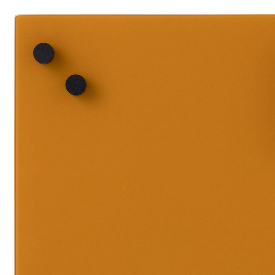Orange wall panel with two black round knobs, featuring a smooth matte finish. Ideal for modern decor.