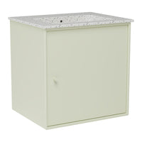 Light green cabinet with a speckled white countertop, featuring a minimalist design and smooth surfaces.