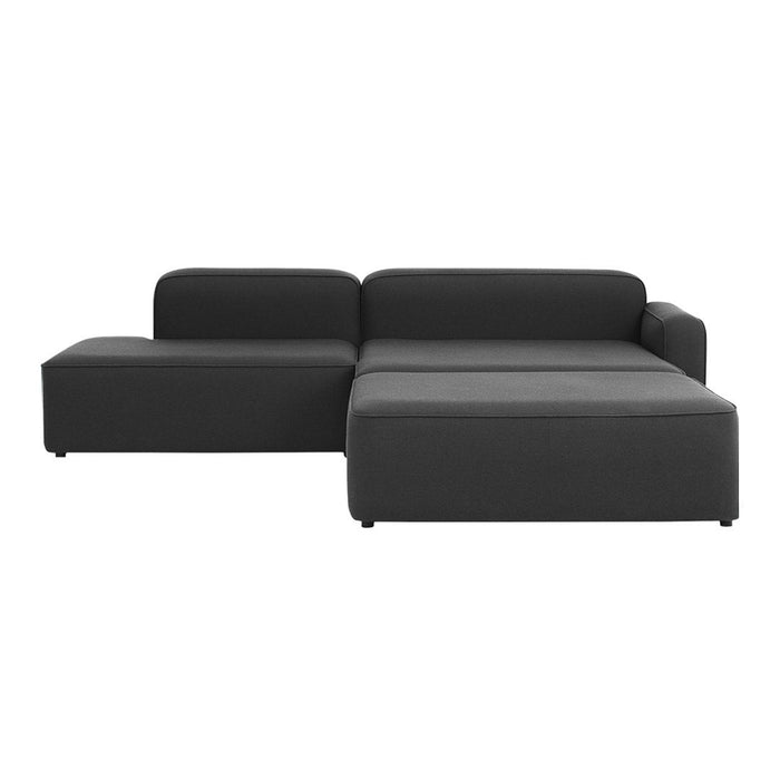 Modern L-shaped sofa in sleek dark gray upholstery with a minimalistic design. Perfect for chic living spaces.