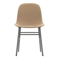 Beige upholstered chair with a smooth finish and sleek silver legs, ideal for modern interiors.