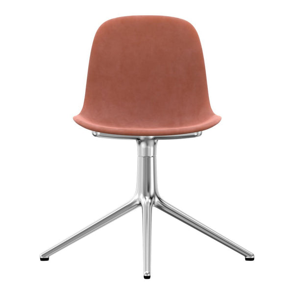 Light pink velvet chair with a sleek silver base, featuring a minimalist design and smooth curves.