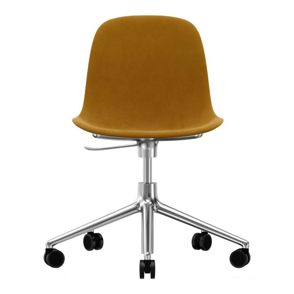Mustard yellow velvet office chair on a chrome base with five wheels, featuring a sleek, modern design.
