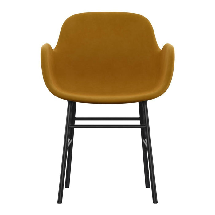 Stylish mustard-yellow chair with smooth fabric and sleek black legs, perfect for modern interiors.