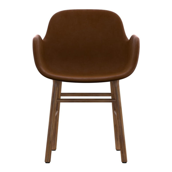 Brown leather chair with smooth finish and natural wood legs. Stylish and modern design for any space.
