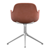 Brown faux leather chair with a sleek chrome base and minimalist design, perfect for modern interiors.