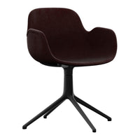 Modern burgundy armchair with a sleek black base and smooth, minimalist design. Perfect for stylish living spaces.