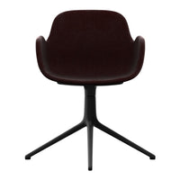 Dark burgundy upholstered chair with smooth contours and a sleek black three-legged base. Perfect for modern decor.