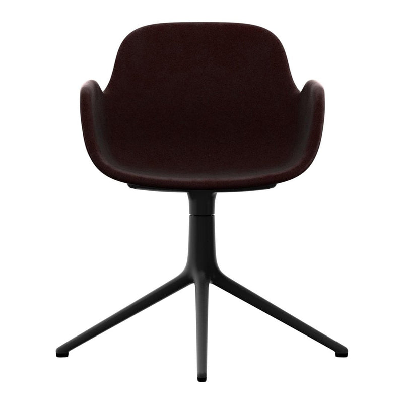 Dark burgundy upholstered chair with smooth contours and a sleek black three-legged base. Perfect for modern decor.