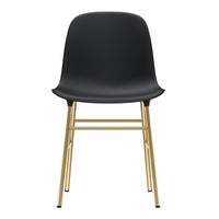 Black chair with a smooth surface and sleek gold legs, featuring a modern, minimalist design.