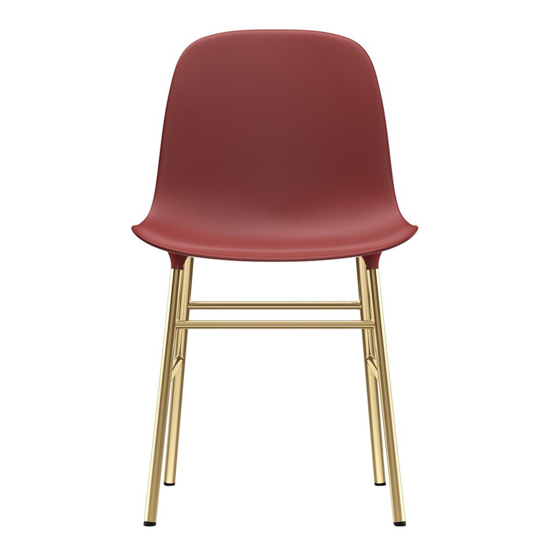 Red modern chair with a smooth, matte finish and gold metal legs, blending contemporary style and elegance.