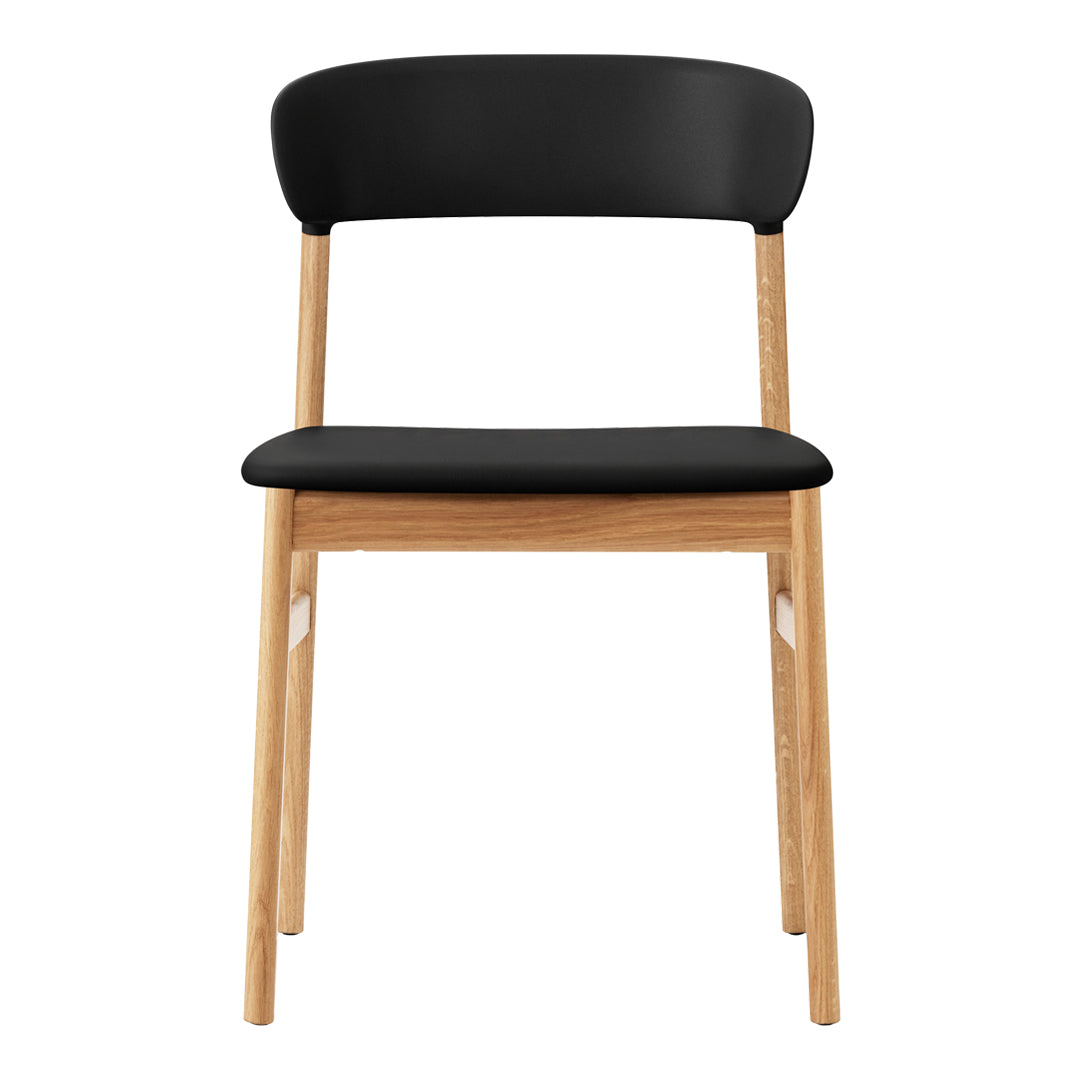 Black upholstered chair with a natural wood frame. Minimalist design featuring solid colors and smooth lines.