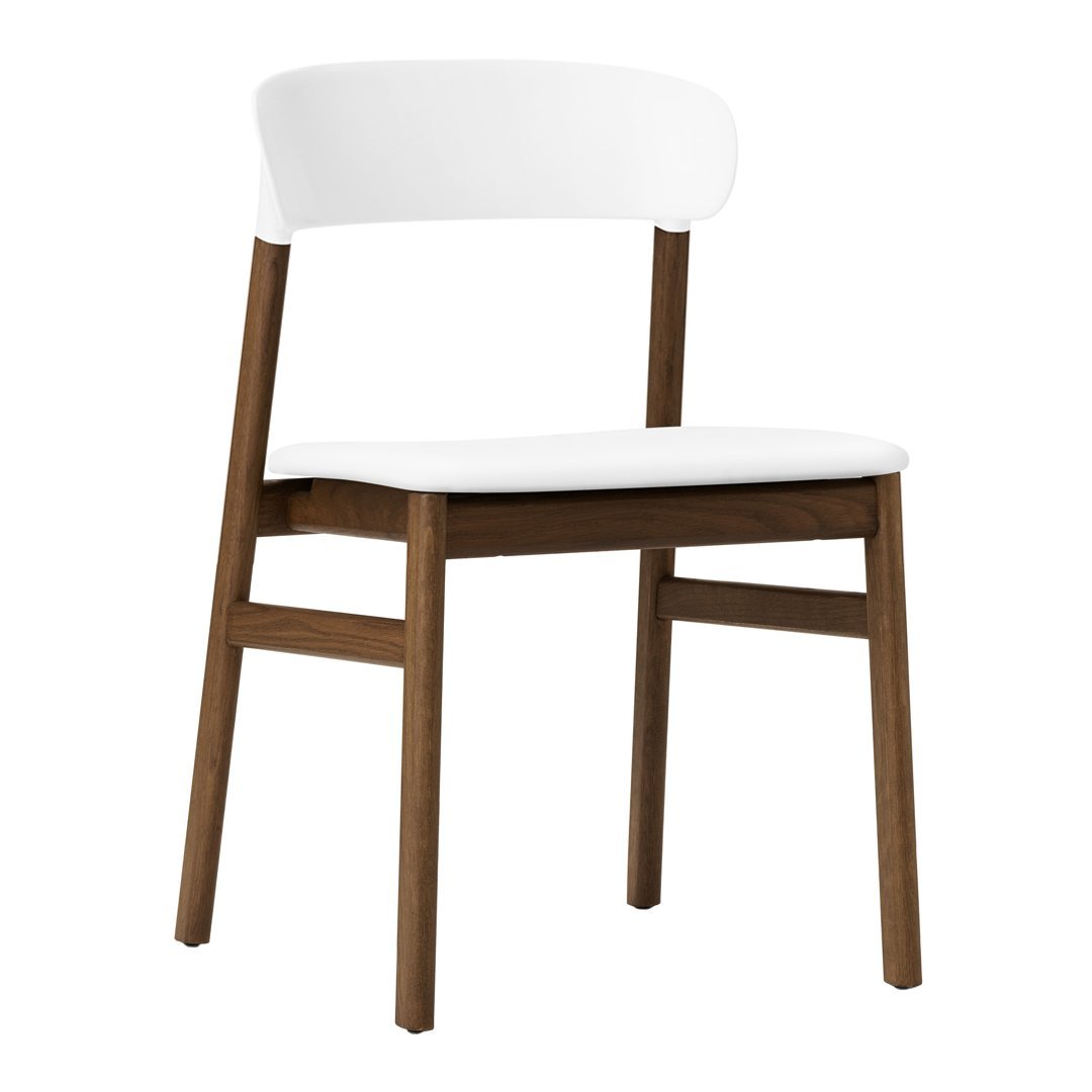 Modern chair with a white seat and backrest, complemented by a rich brown wooden frame.