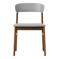 Gray upholstered chair with a smooth finish and natural wood legs, featuring a minimalist design.