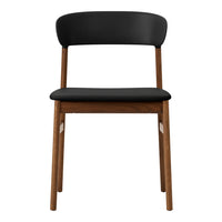 Black upholstered chair with a sleek wooden frame in natural finish, showcasing a minimalist design.