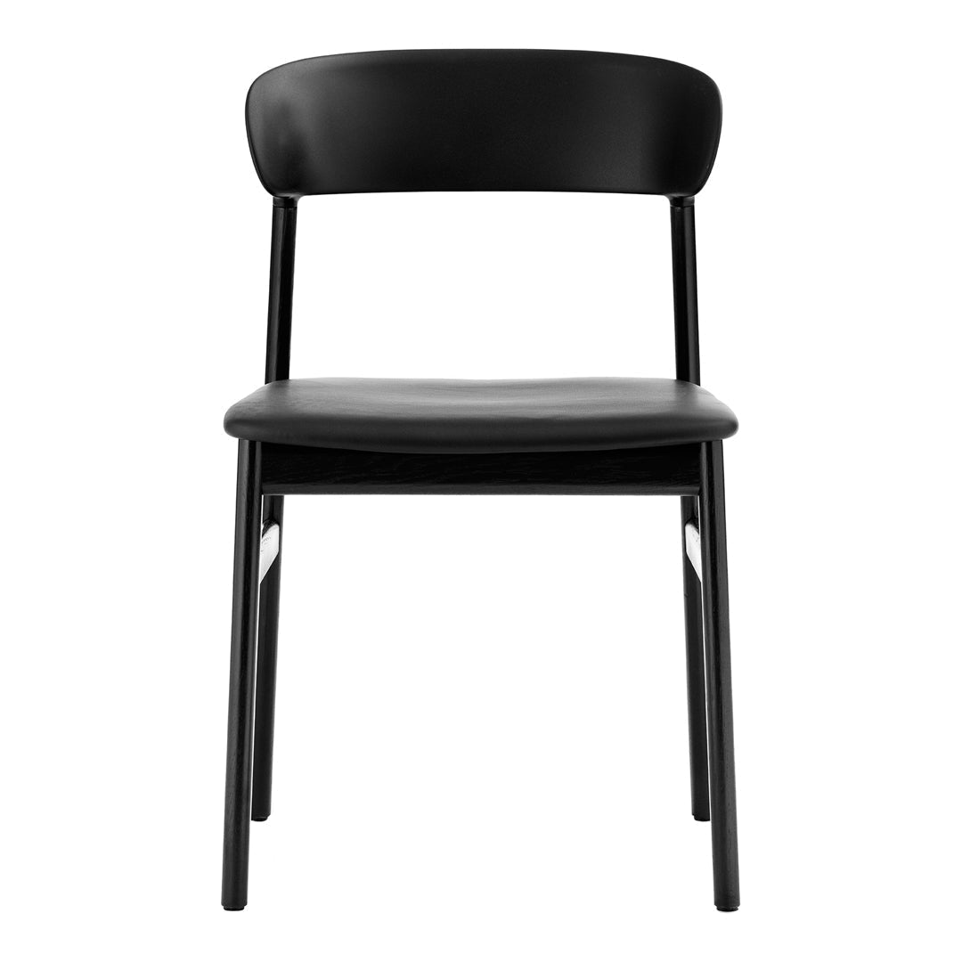 Black wooden chair with a smooth finish and minimalist design, featuring a simple, sleek silhouette.