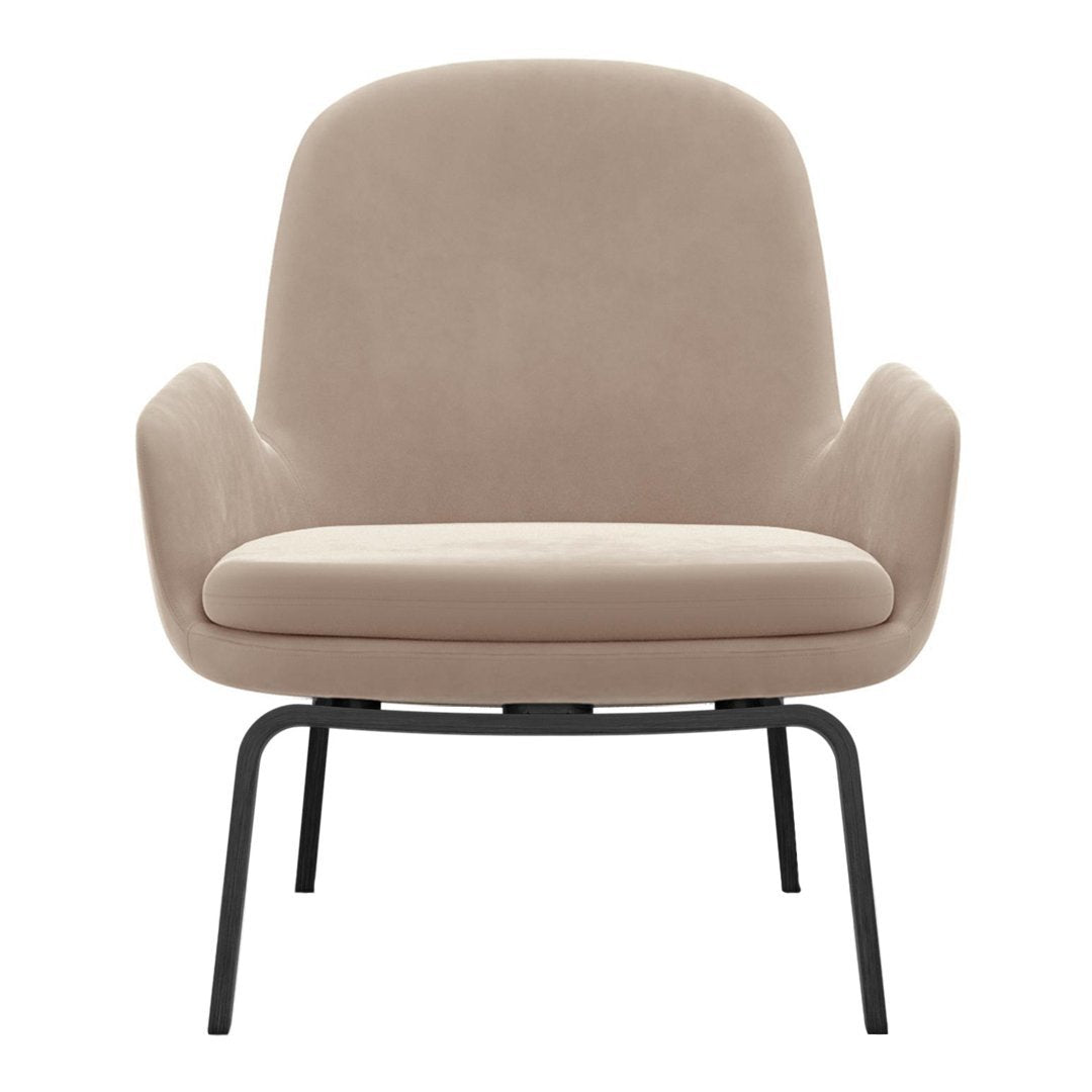 Soft beige upholstered chair with smooth, minimalist design and black metal legs. Ideal for modern decor.