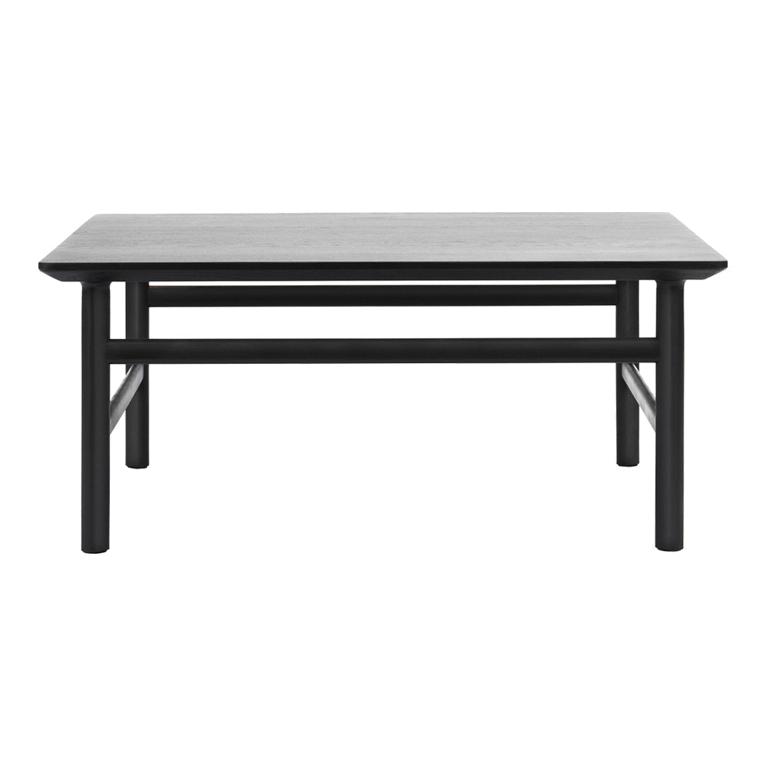Stylish gray tabletop with sleek black legs, featuring a minimalist design perfect for modern decor.