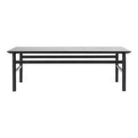 Black metal coffee table with a sleek rectangular design and smooth gray tabletop. Modern minimalist style.