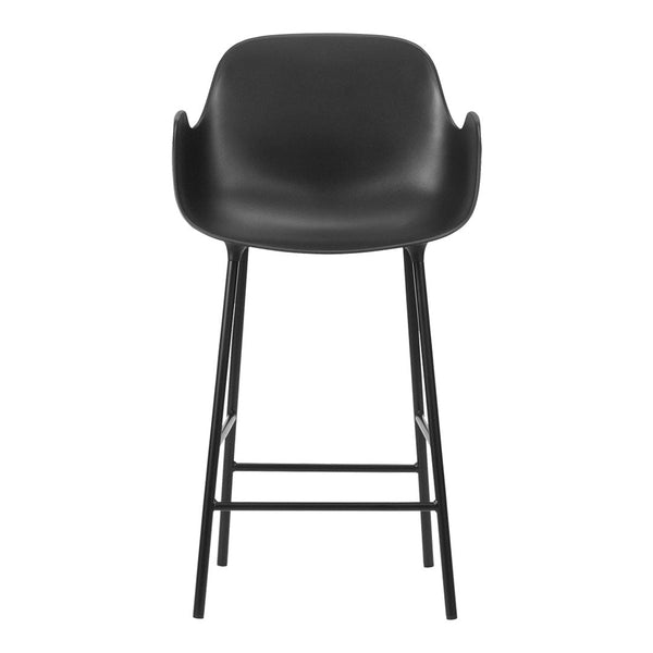 Black bar stool with a smooth, curved seat and sleek metal legs for a modern aesthetic. Perfect for contemporary spaces.