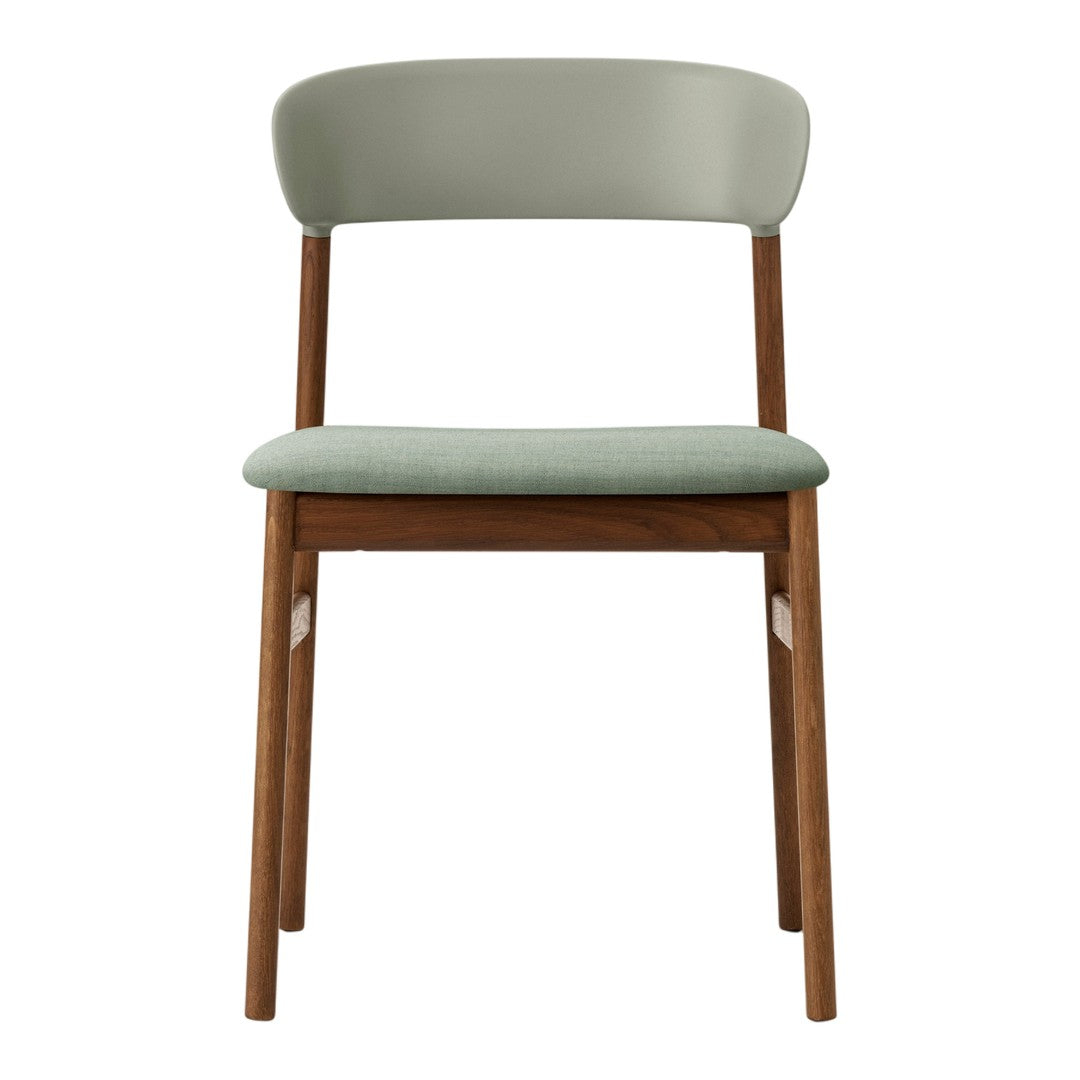 Green upholstered chair with a wooden frame, featuring a minimalist design and soft, muted colors.