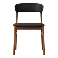 Black and gray chair with smooth wood legs, featuring a minimalist design and contemporary color palette.