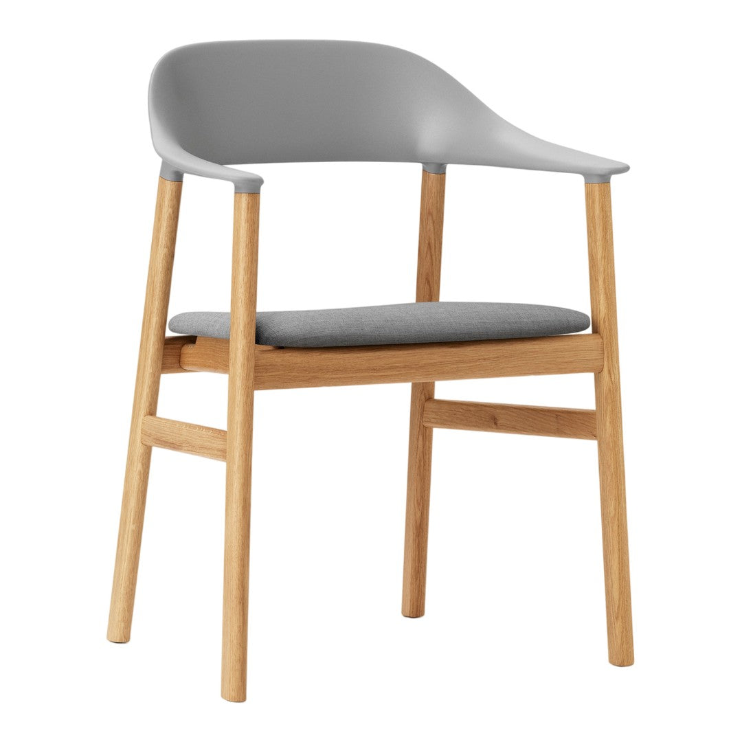 Stylish gray chair with a smooth finish and natural wooden legs, featuring a modern minimalist design.