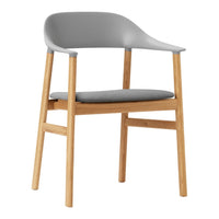 Stylish gray chair with a smooth finish and natural wooden legs, featuring a modern minimalist design.