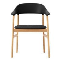 Black and wooden chair with a sleek design and gray upholstered seat, showcasing minimalistic elegance.