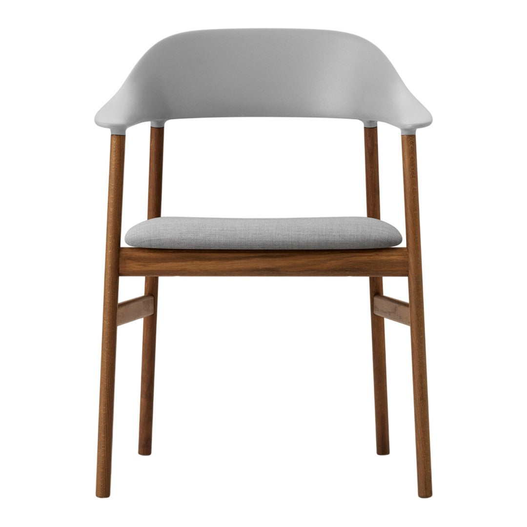 Modern chair with a light gray seat and backrest, complemented by a warm wood frame. Sleek and minimalist design.
