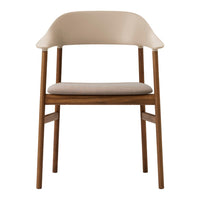 Beige chair with a smooth, rounded backrest and wooden legs, featuring a minimalist design and natural tones.