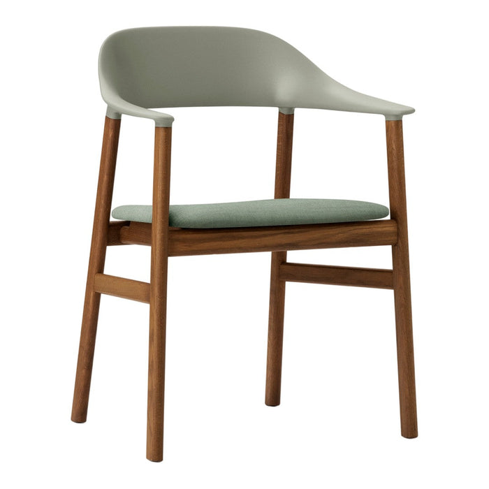 Modern chair featuring a soft green seat and backrest, paired with warm wooden legs for a stylish contrast.