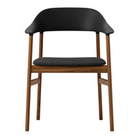 Black and gray chair with a smooth plastic seat and a wooden frame, featuring clean lines and modern design.