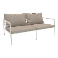 Beige cushions on a sleek white metal frame, featuring a simple, modern design. Ideal for stylish outdoor seating.