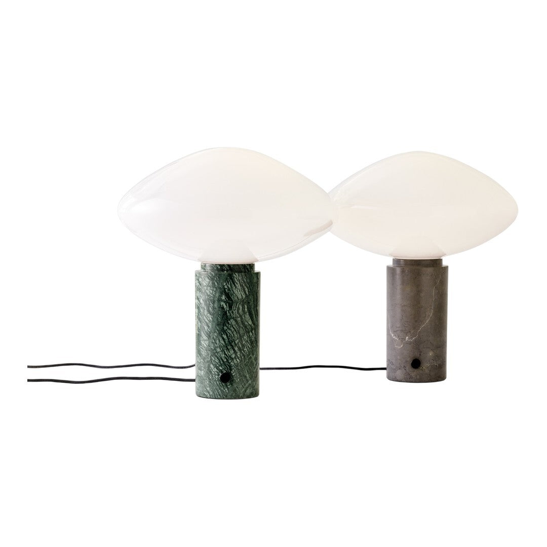 Green and gray marble base lamps with white glass shades, featuring sleek, modern designs. Perfect for stylish decor.