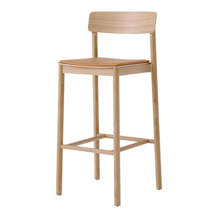 Natural wood bar stool with a light finish and simple design, featuring a smooth, tan seat and minimalist style.