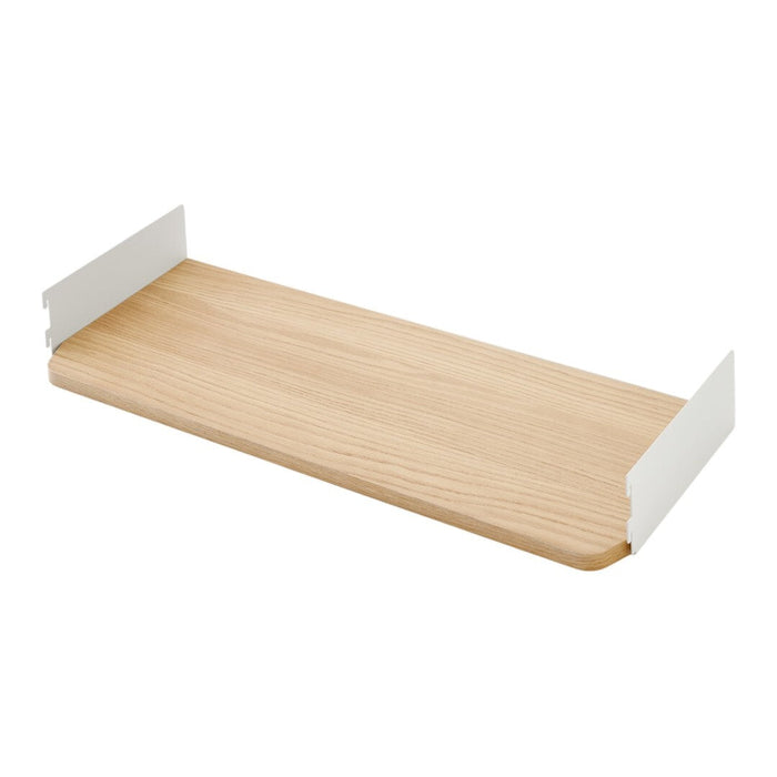 Light wood shelf with a natural grain pattern and sleek white brackets for a modern, minimalist look.